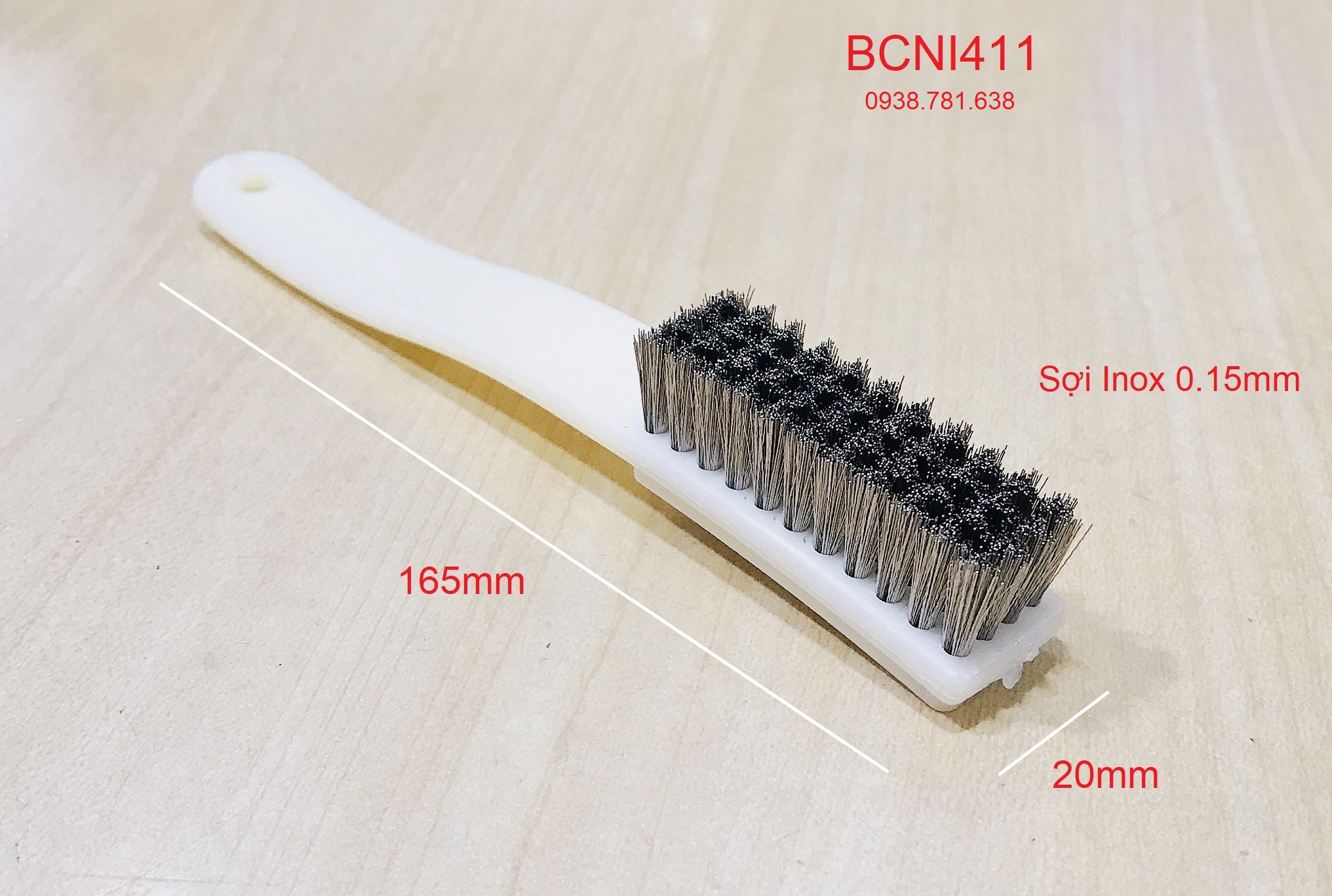 Bàn chải cán nhựa sợi cước inox 411