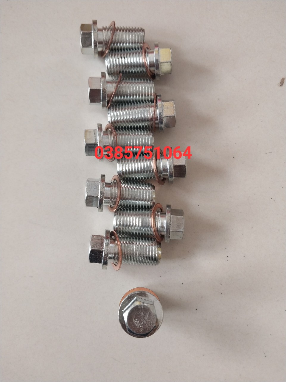Ốc xả nhớt đáy catte dùng cho xe mercedes sprinter 16 chỗ