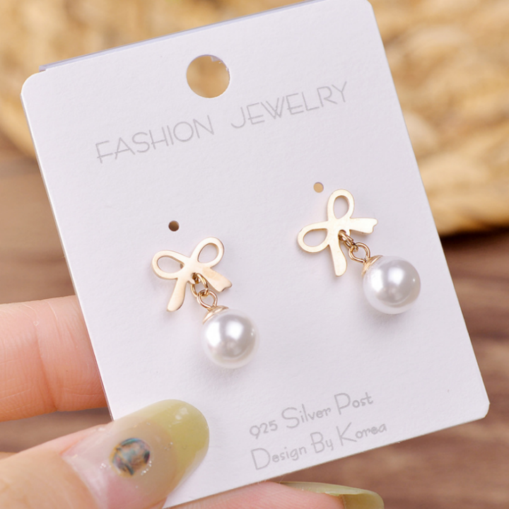 Bông tai nữ chiếc nơ rớt ngọc trai bằng titan luôn sáng, bóng, đẹp - Đảm bảo không đen, không rỉ sét vĩnh viễn