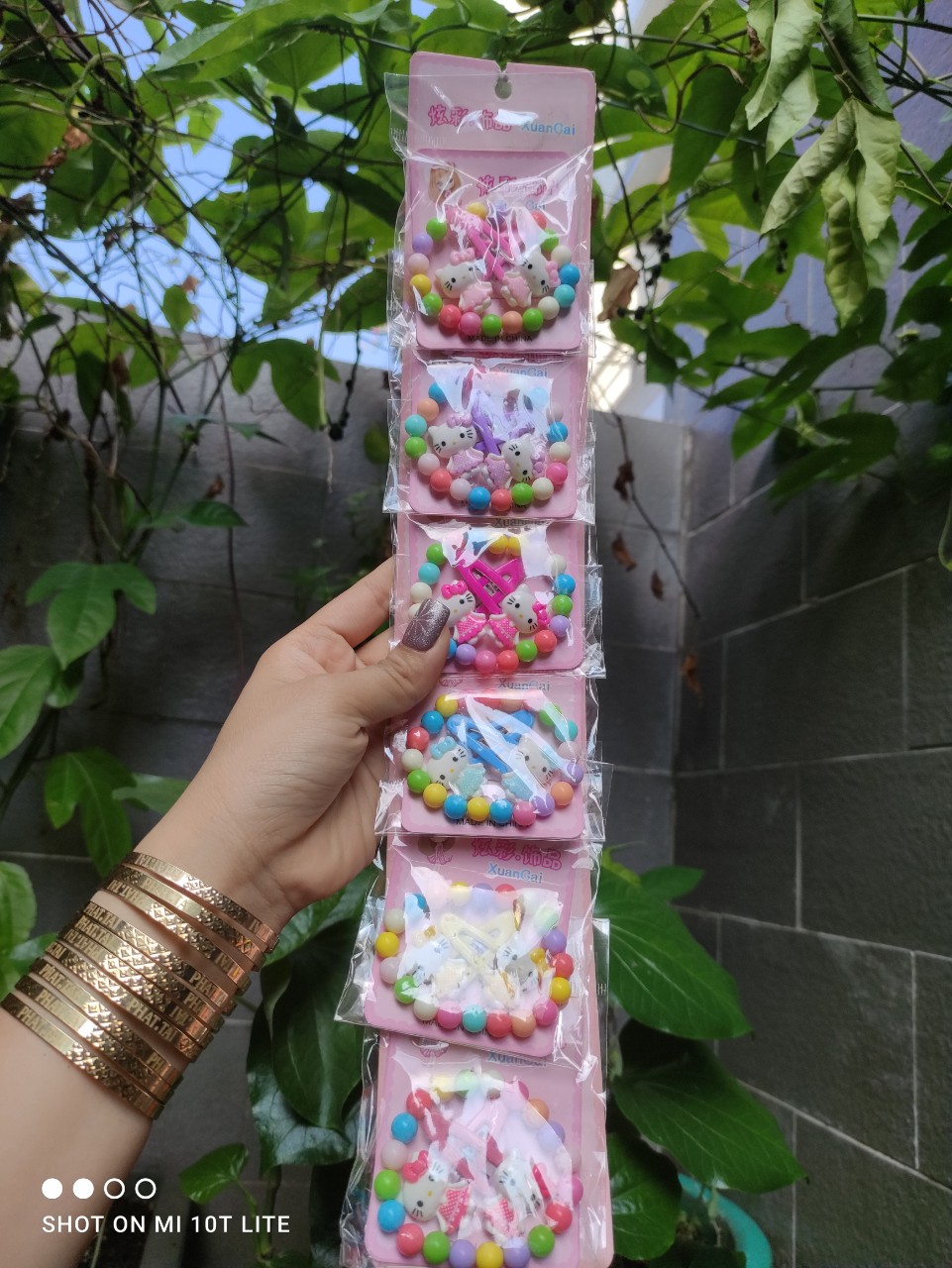 [HCM]Sét 2 kẹp bấm và vòng tay hello kitty - Màu ngẫu nhiên