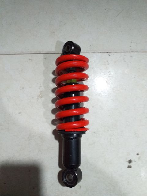 Giảm sóc sau xe điện Xmen