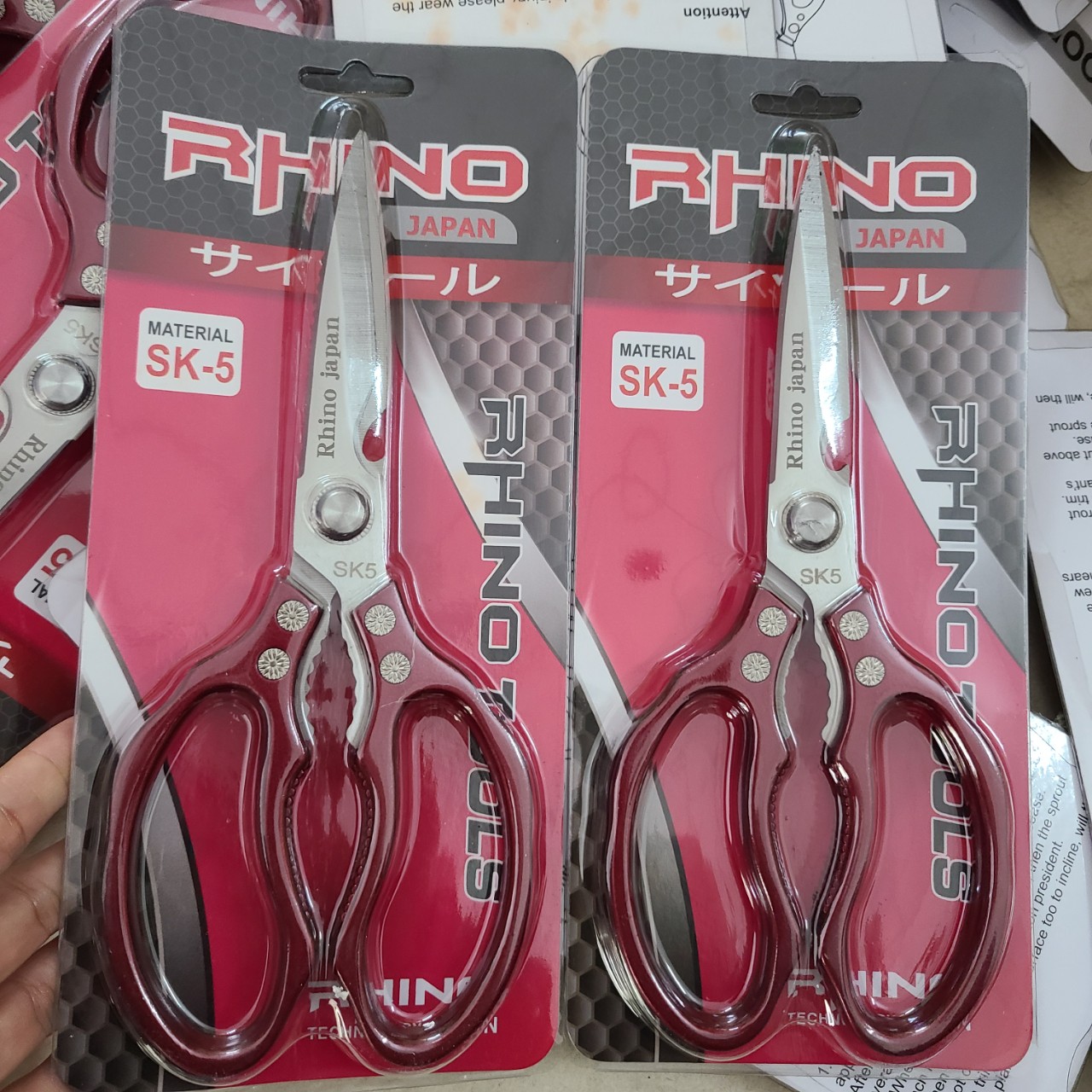 Kéo tay cầm đỏ đô rhino_răng cưa + khui bia + kẹp càng cua