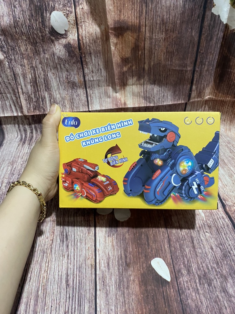 Đồ chơi xe khủng long biến hình xoay phát nhạc có đèn vui nhộn cho bé hkm từ ENFA