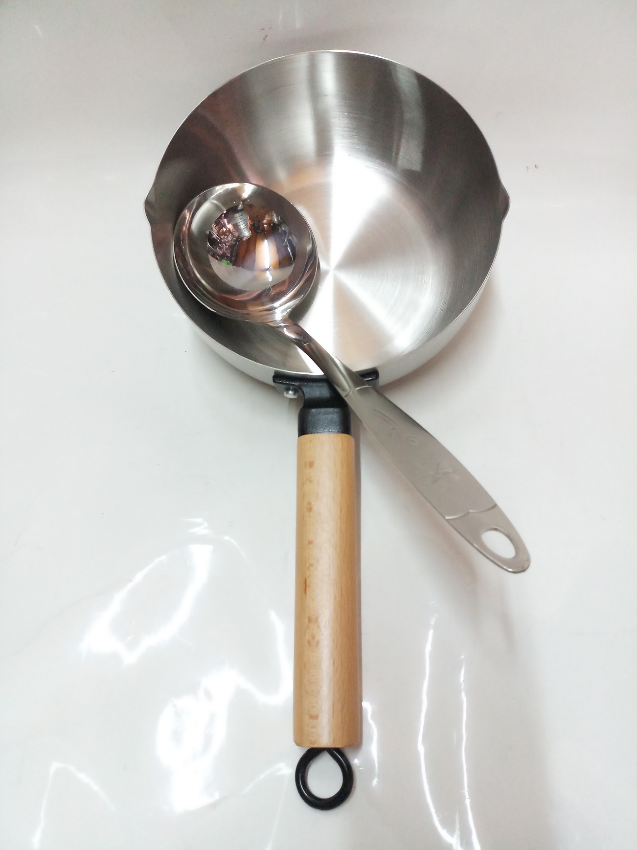 Combo 1 ca inox cán gỗ 20cm+1 vá inox.