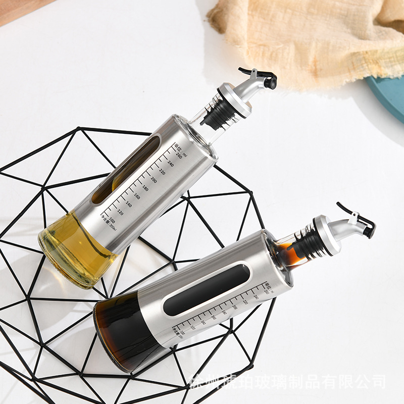 Bình rót dầu , đựng dầu ăn nước mắm thuỷ tinh bọc inox dung tích 500ml
