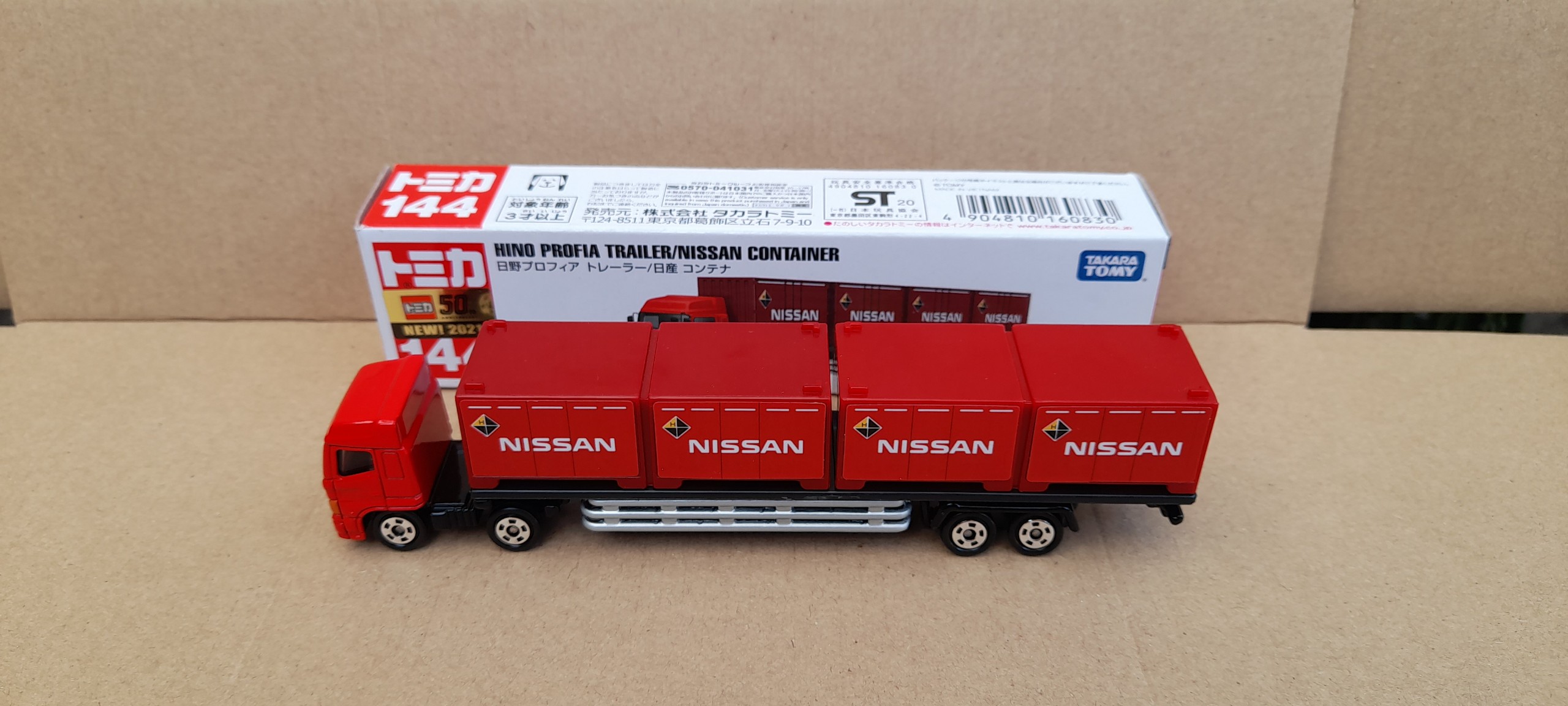 Xe mô hình Tomica (Có hộp số 144) - Xe Dài 15cm - Xe Container Nissan màu đỏ giá rẻ cho bé sưu tập