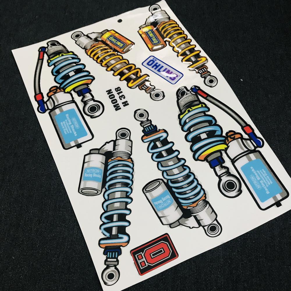 TẤM TEM LOGO NỔI DÁN XE HÌNH DẠNG PHUỘT CỦA THƯƠNG HIỆU OHLINS VÀ NITRON ( TEM OHLINS VÀ NITRON)