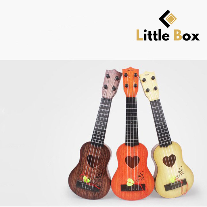 Đồ chơi đàn ukulele phát nhạc cho bé - giúp bé phát triển âm nhạc