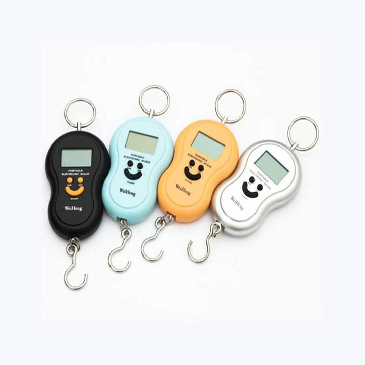 Cân cầm tay mặt cười