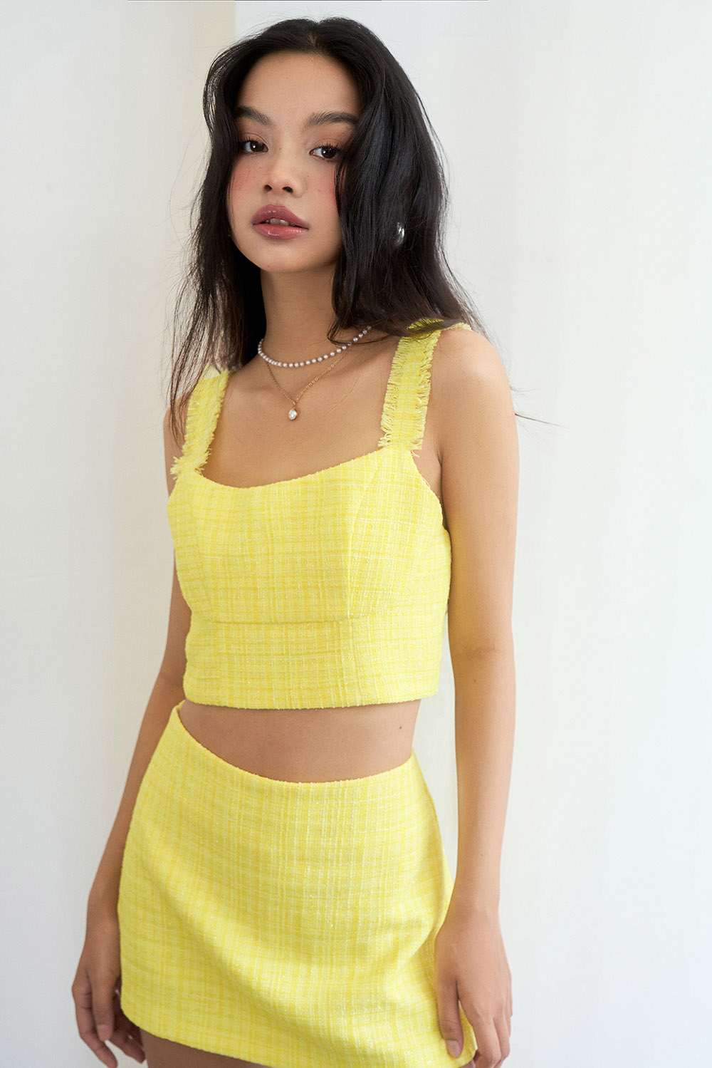 [OUTLET SALE] DOTTIE - Áo hai dây vải tweed gắn tua rua nữ DOTTIE vàng - T0589