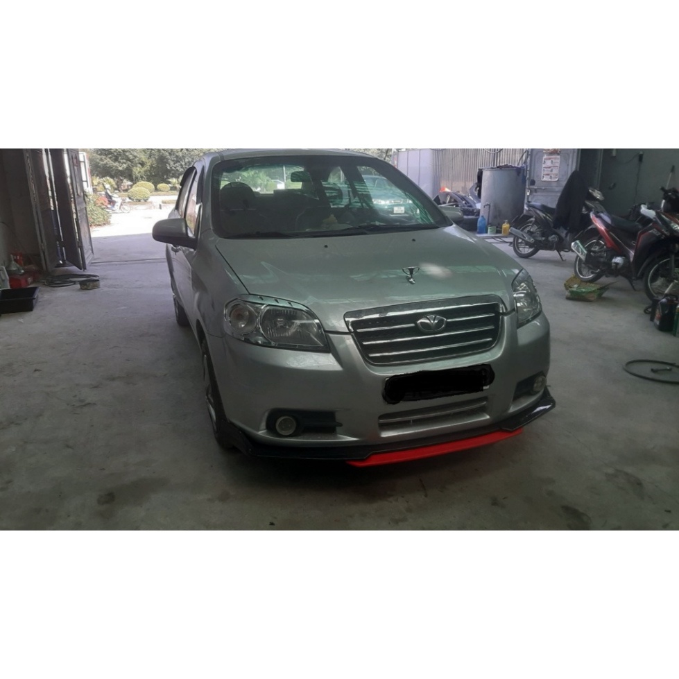Lip po trước xe gentra - aveo