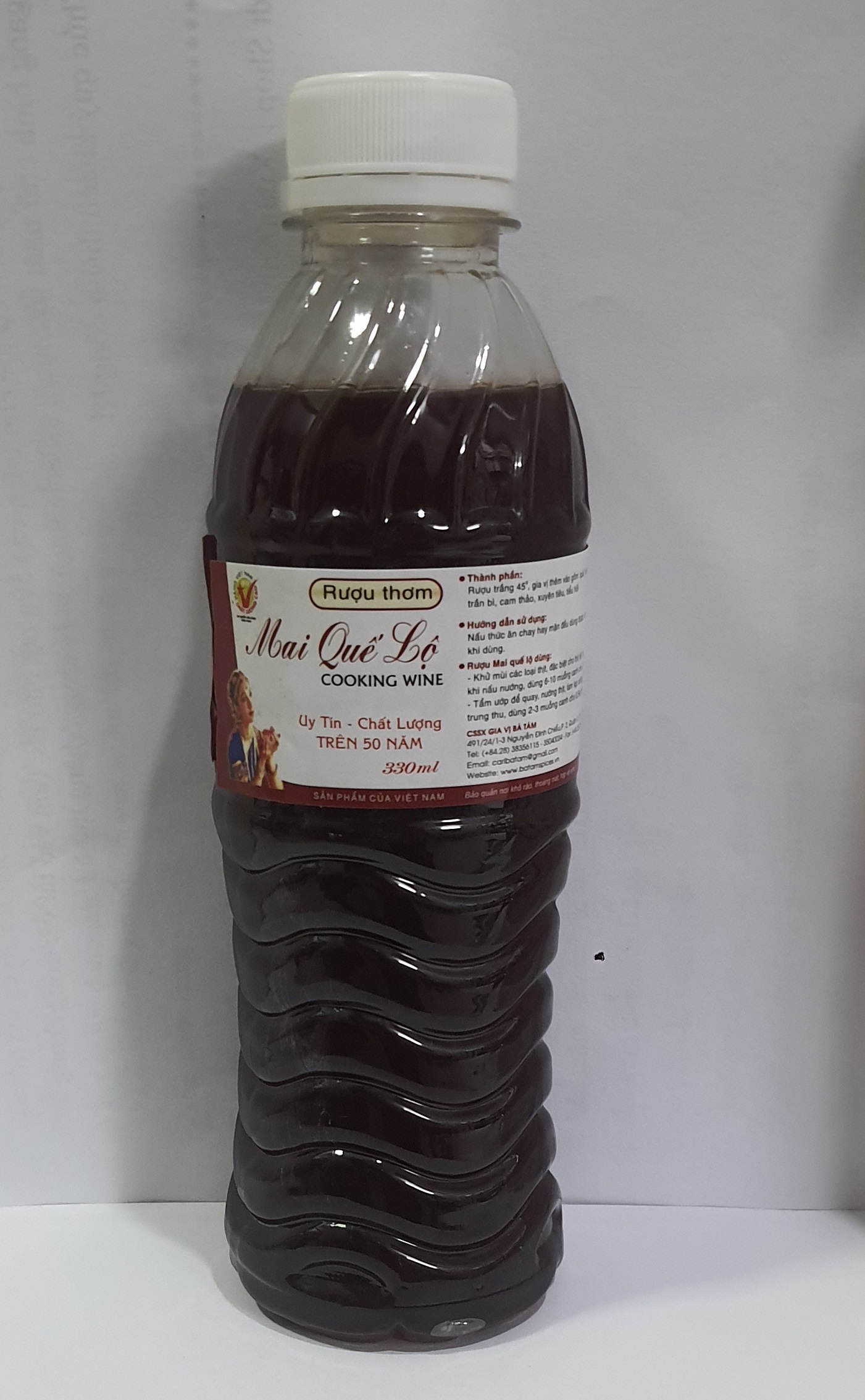 Gia vị rượu thơm mai quế lộ bà tám chai 330ml