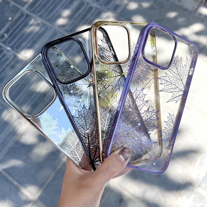 Ốp DEVIA lưng cứng viền si bóng hình lá phong đính đá Iphone 14/ ip14 pro/ ip14 plus/ ip14 pro max