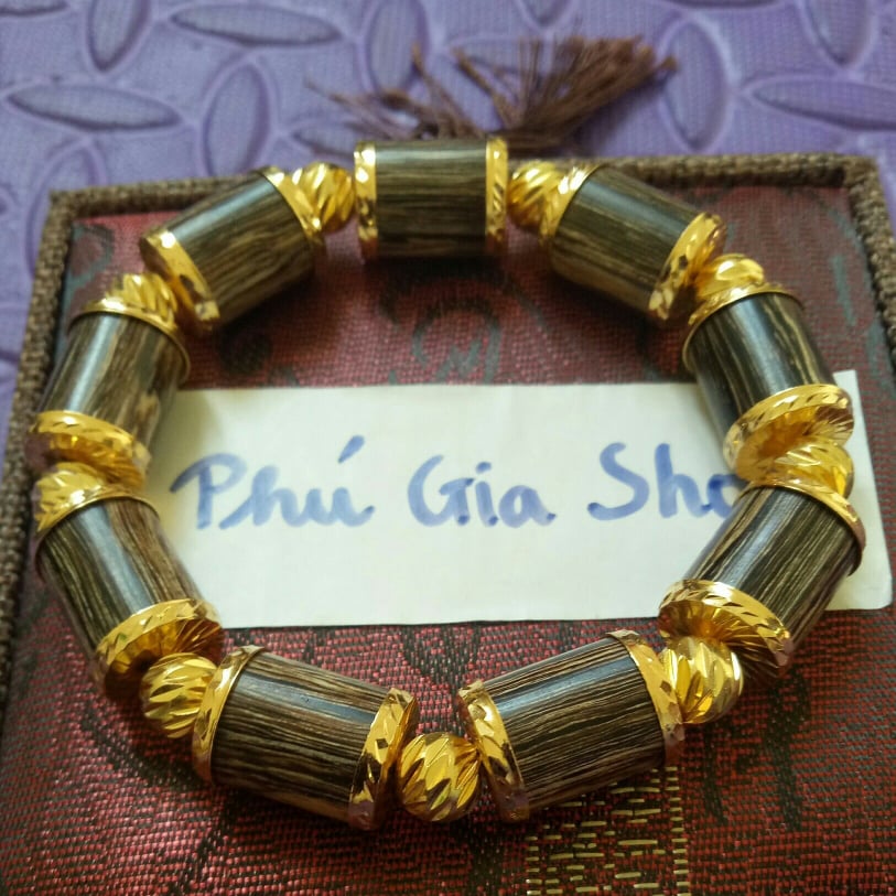 Vòng tay gỗ trầm hương sánh chìm bọc vàng non hai đầu+Hương thơm vĩnh viễn