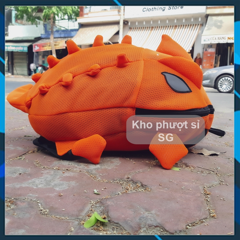 Balo khủng long đựng nón bảo hiểm màu cam siêu cute - Balo du lịch hình khủng long cam