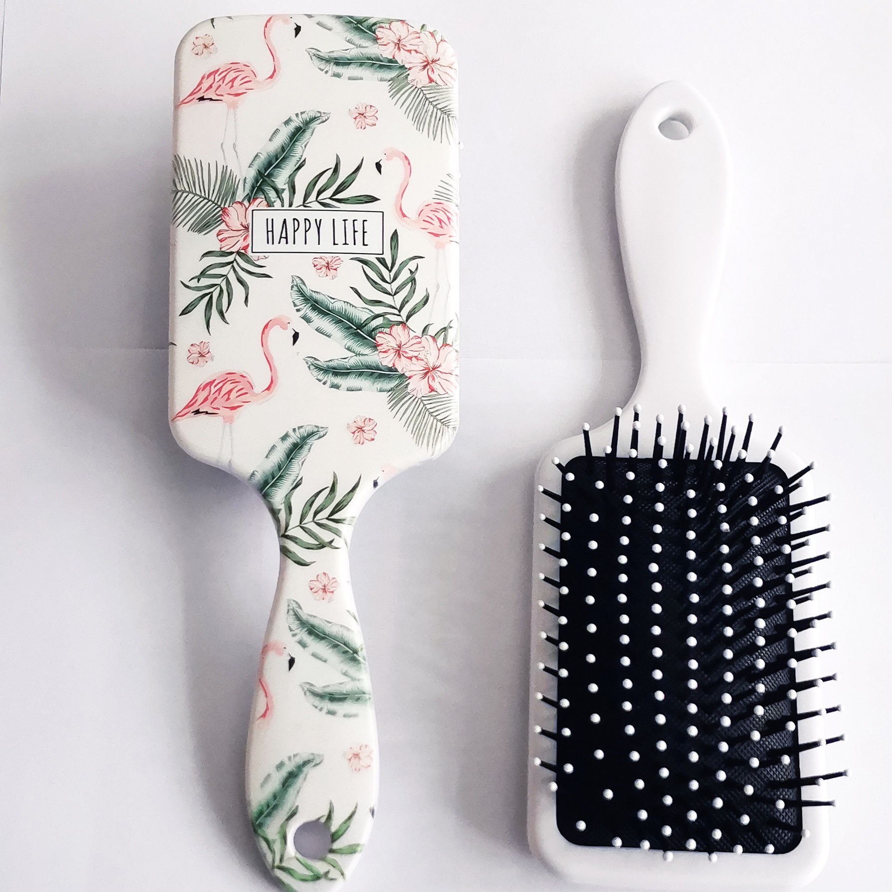 Lược gai nhựa hỗ trợ chải cúp tóc khi sấy