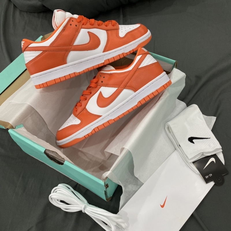 Giày sb dunk trắng cam da thật lai au
