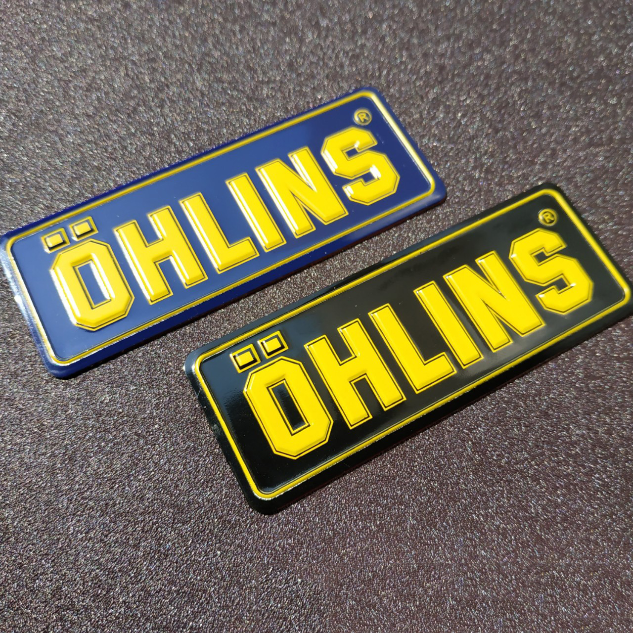 Tem nhôm dán Pô Ohlins Ohlin chữ vàng 8x3 cm