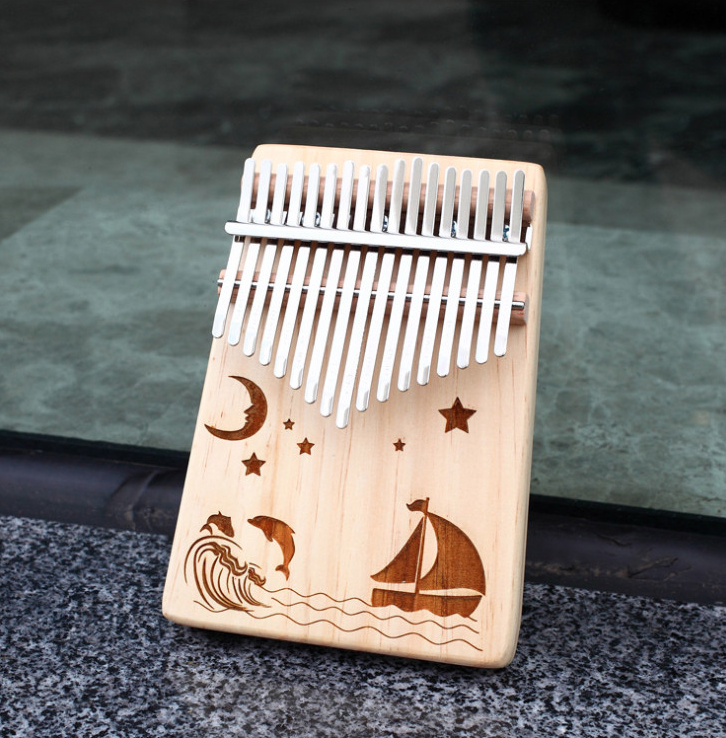 Đàn kalimba 17 phím khắc thuyền biển, tặng đầy đủ phụ kiện, túi, búa, hướng dẫn tự học, khăn lau, dán phím