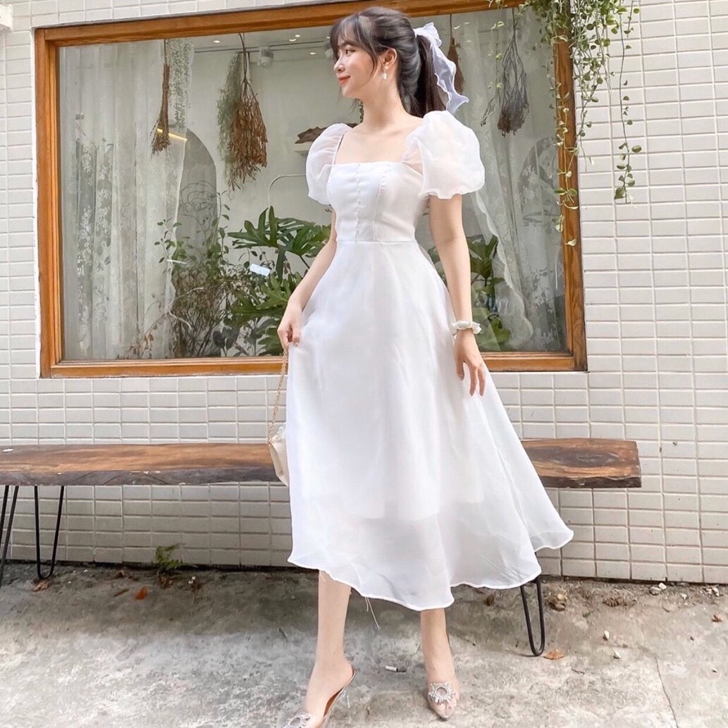 Đầm midi trắng phối nút bọc tay voan búp