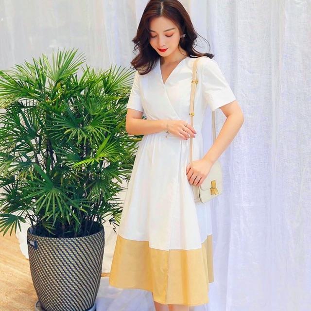 Đầm trắng tùng phối vàng