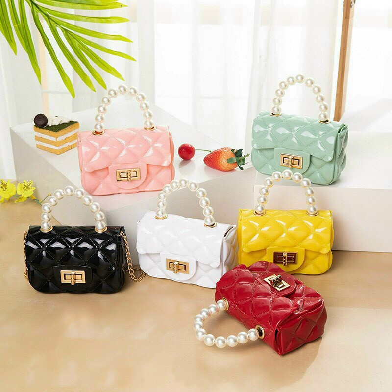 Túi xách mini quai ngọc cho bé sắp đến tết rồi , năm ngoái mẹ nào mua rồi thì biết túi đẹp dã man luôn
