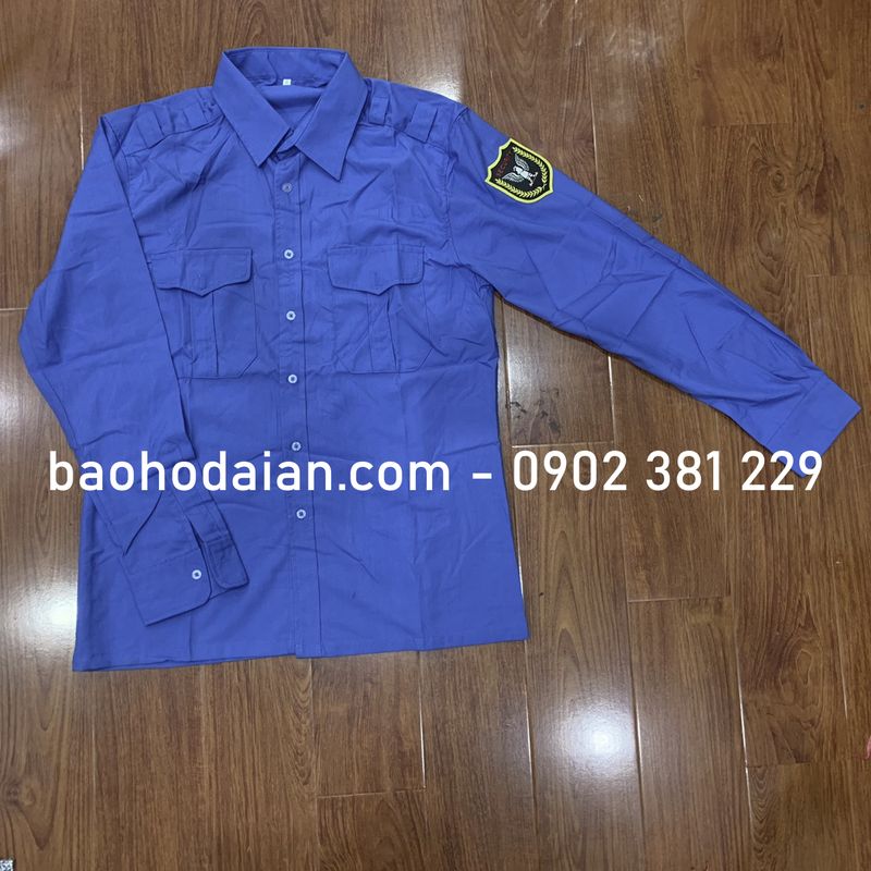 Áo bảo vệ vải Kate Mỹ tay dài màu xanh đậm logo tay thấm hút mồ hôi