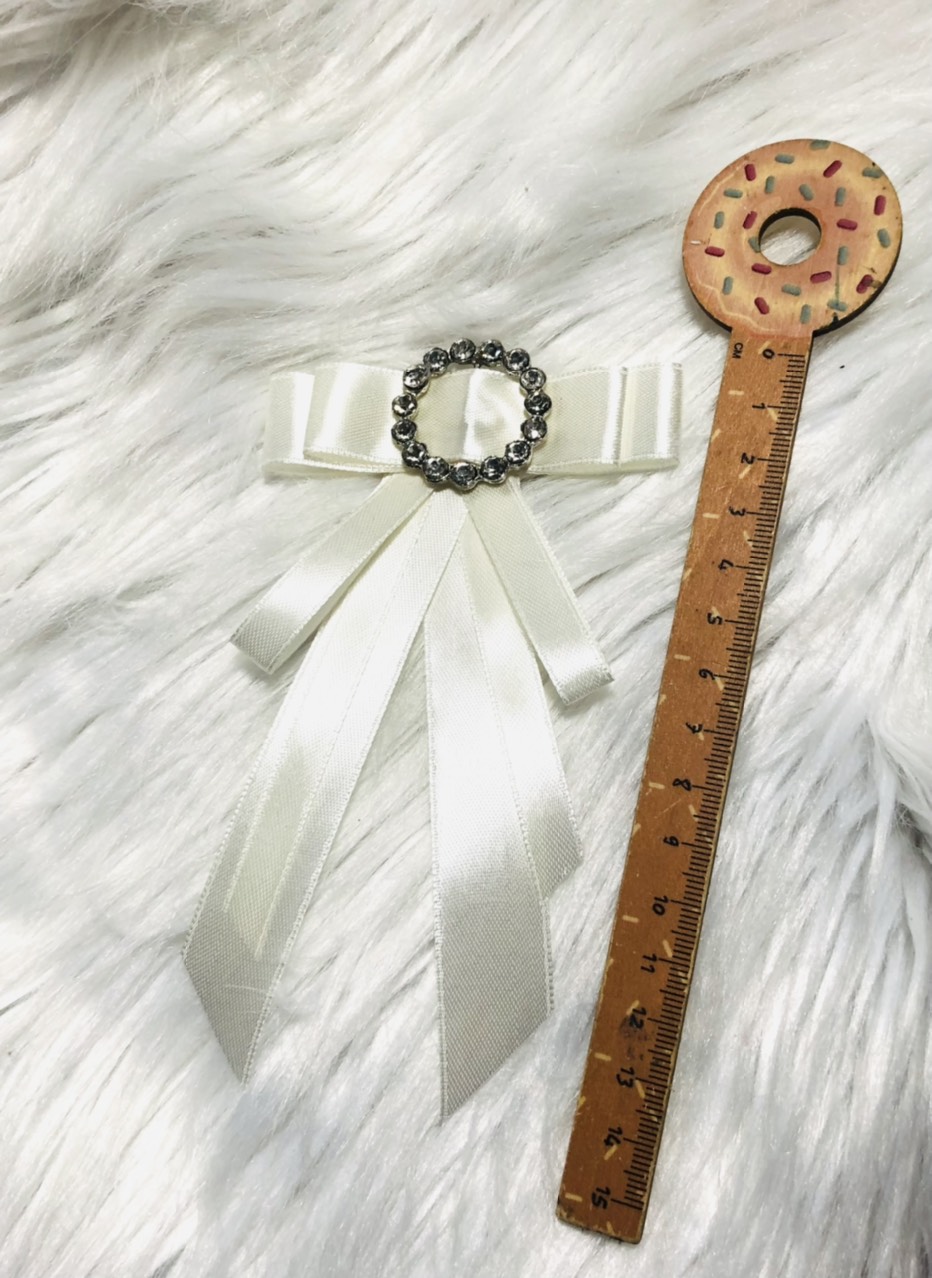 Cài áo nơ xinh. kt 8 x15cm. shop có nhận thiết kế theo yêu cầu của khách