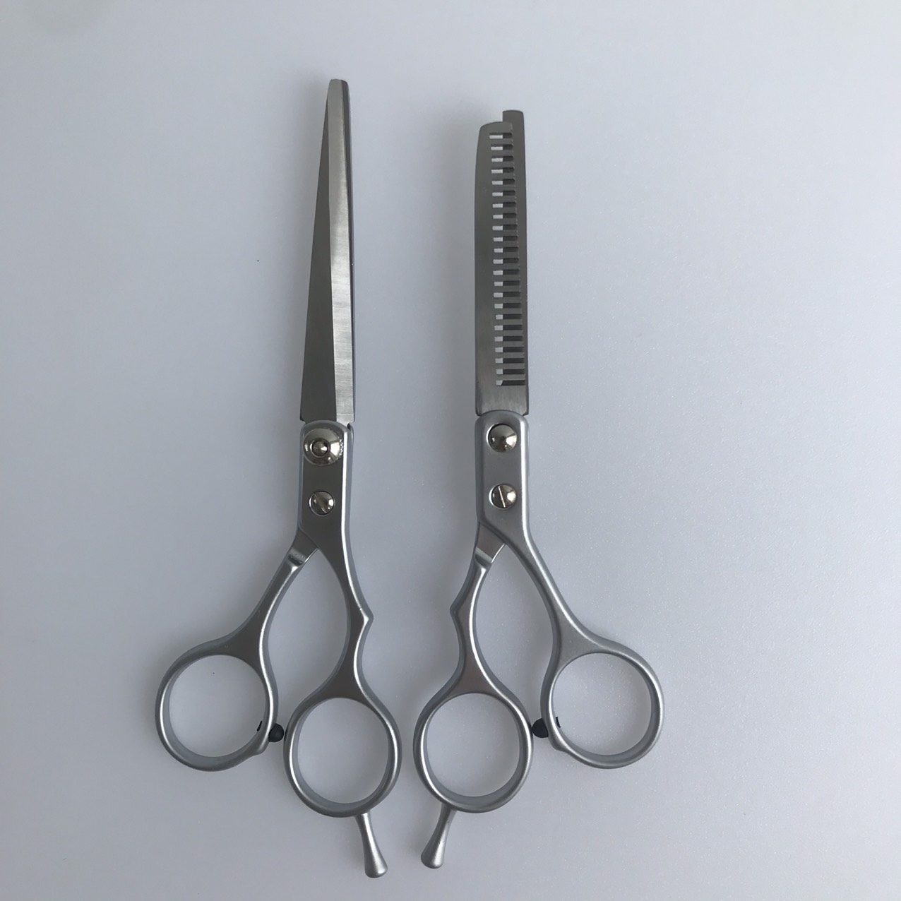 Bộ kéo cắt tóc thép không rỉ nhập khẩu đức kéo cắt tóc thẳng kéo tỉa tóc bộ kéo cắt tóc gia đình