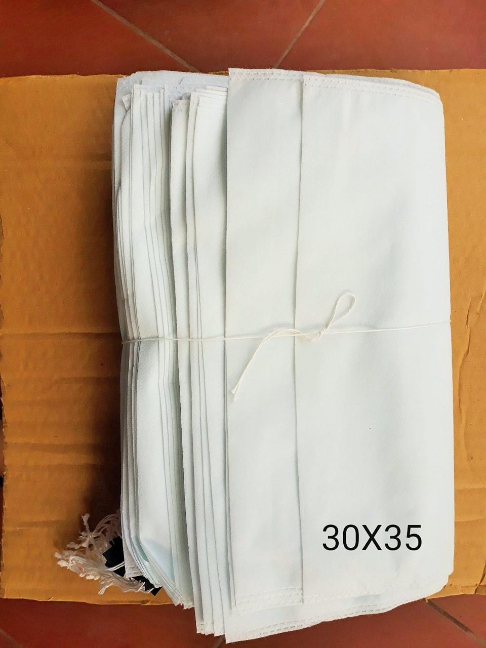 TÚI BỌC TRÁI CÂY BƯỞI, MÍT, SẦU RIÊNG BỊCH 50 TÚI CÓ DÂY RÚT 30X35CM