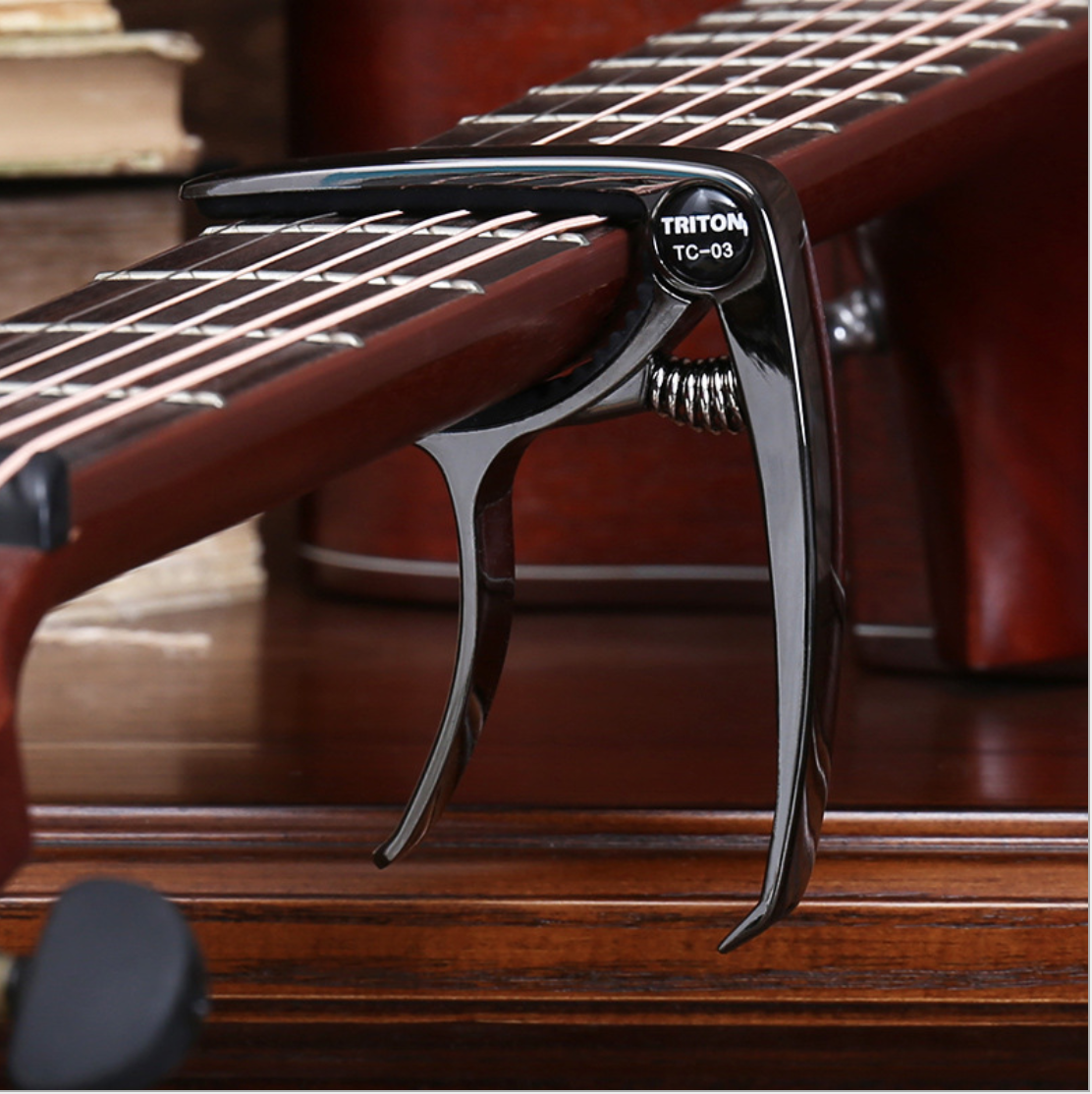 Capo Đàn Guitar/Ukulele Vân Gỗ TC-03