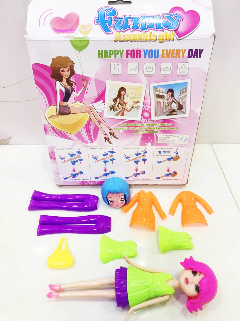 Đồ chơi búp bê gồm quần áo và phụ kiện