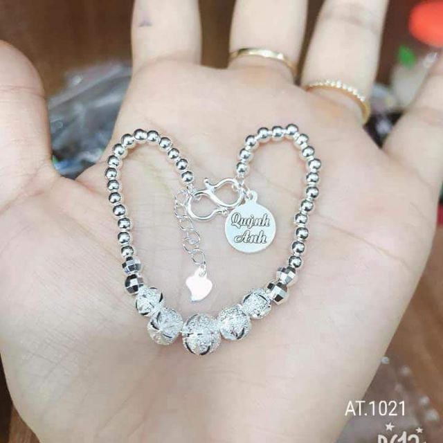 Lắc bi bạc bé gái mix mặt bạc khắc chữ theo yêu cầu, chất lượng đảm bảo an toàn đến sức khỏe người sử dụng, cam kết hàng đúng mô tả