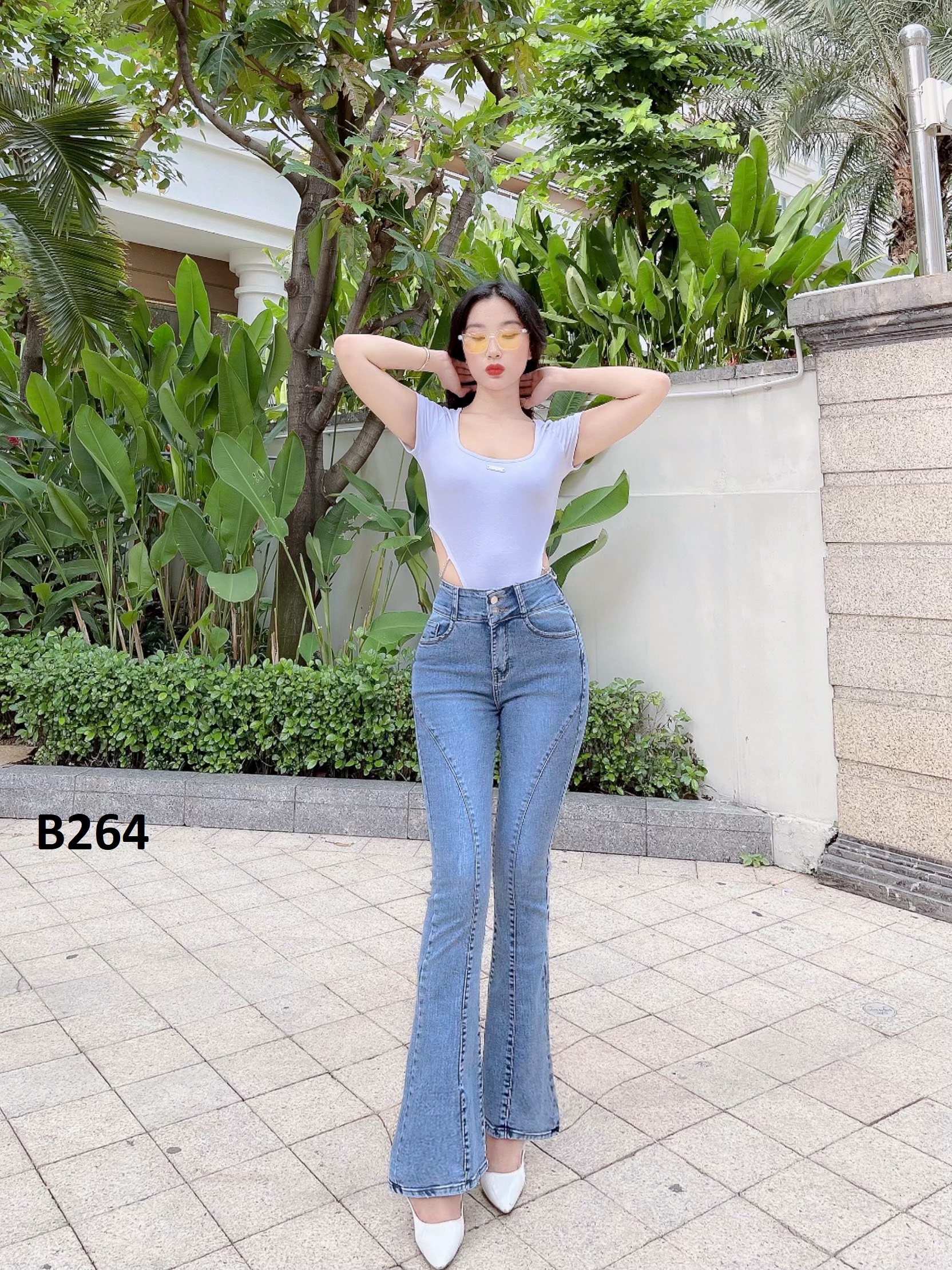 Quần jean nữ loe gân xanh đá chất co giãn