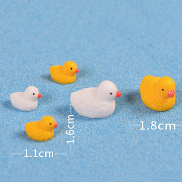 Phụ kiện tiểu cảnh giá sỉ - vịt lông vũ - 1.1x1.6cm .