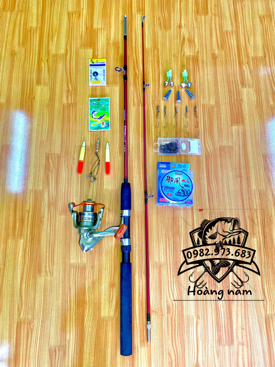 Combo cần đặc 2 khúc shimano + máy kim loại yomoshi cước shimano trắng cần có 3 màu xanh + đỏ + đen