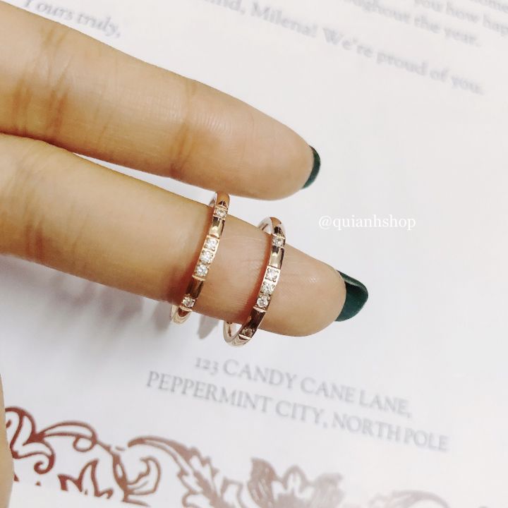 Nhẫn titan đính 5 đá màu vàng hồng
