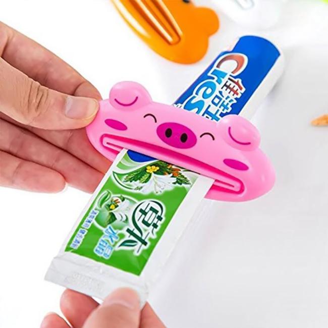 Dụng cụ kẹp kem đánh răng hình thú