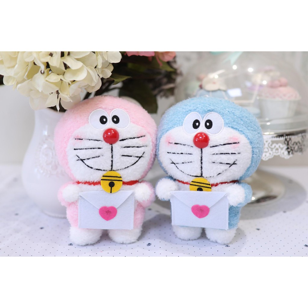 Gấu bông doraemon lông xù ôm thư G2B96 gấu bông 20cm