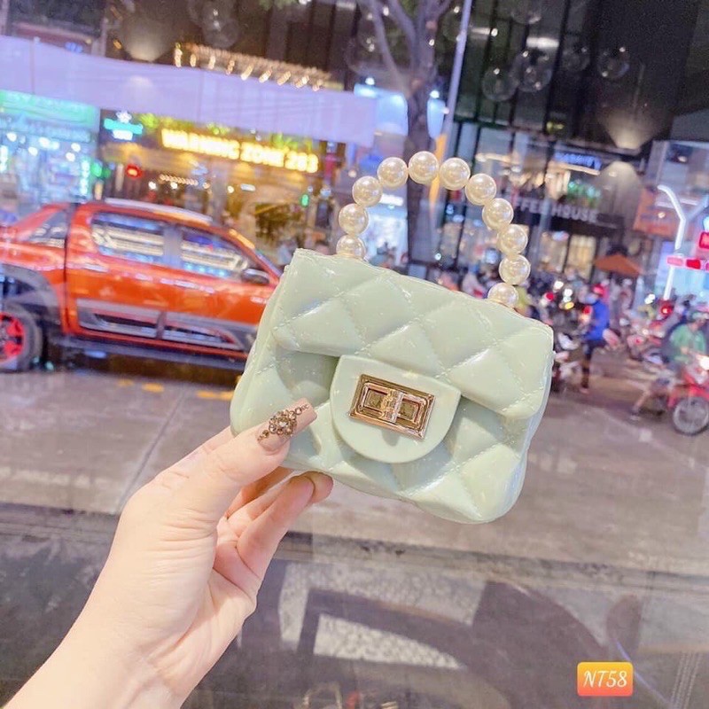 Túi mini silicon quai ngọc xinh xắn,túi cn nhựa bóng mini .