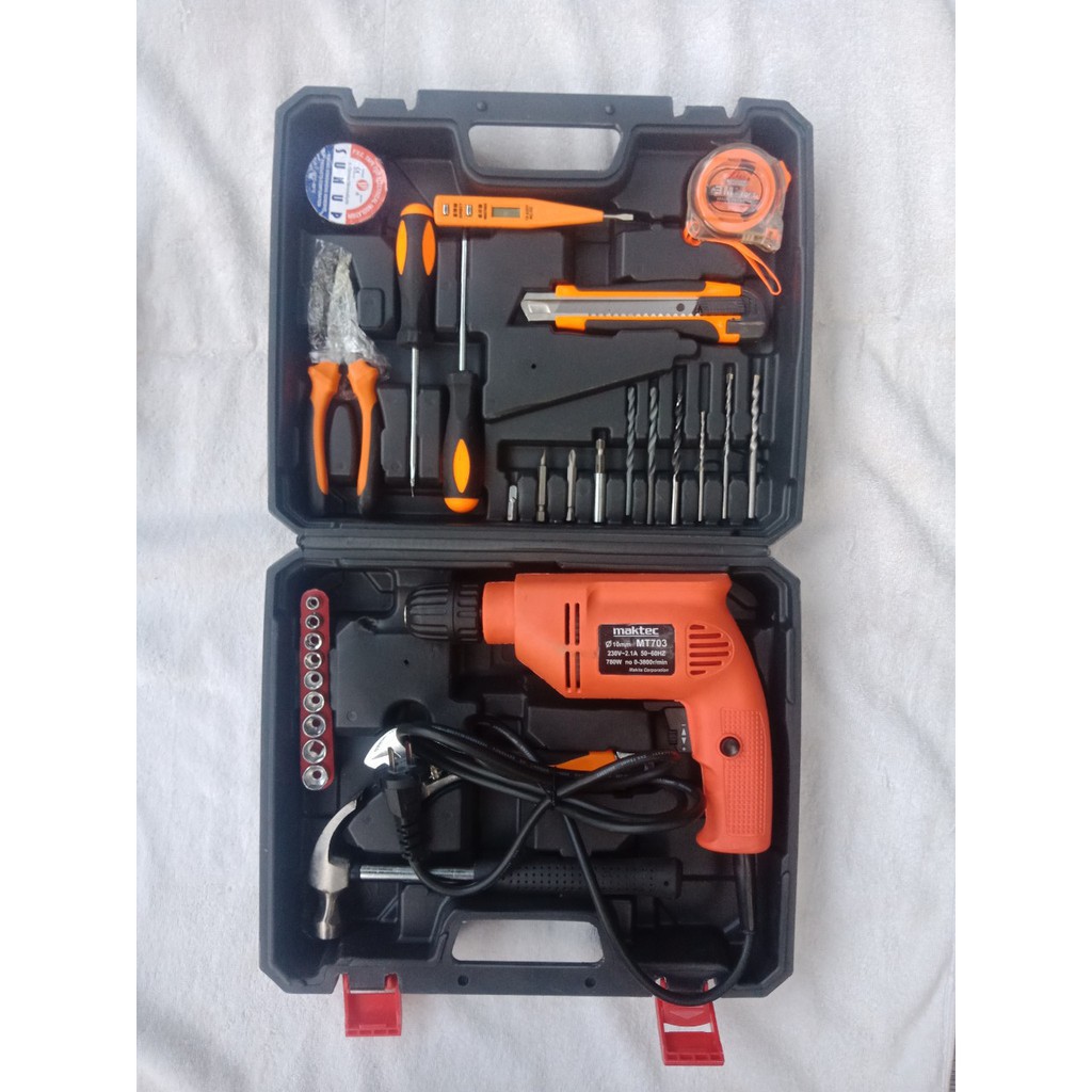 Máy khoan Maktec MT-703 - may khoan cam tay