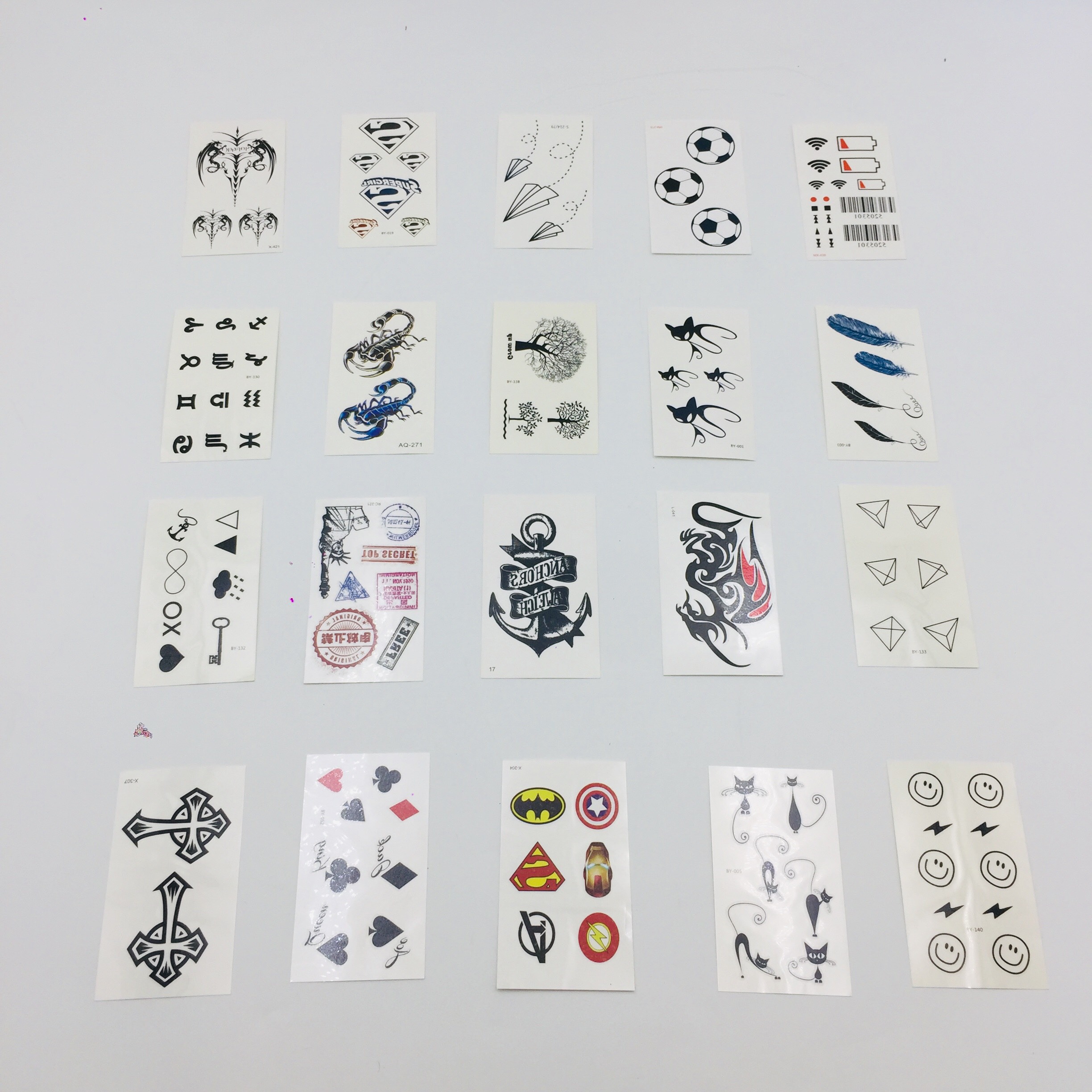 Combo 20 tấm xăm dán mini cực chất cho nam gồm nhiều mẫu mã, biểu tượng Spider-Man, hình con dấu, con rồng, con bọ cạp, mỏ neo, thánh giá, cung hoàng đạo, hình mặt cười, hình wifi, mã pin, trái tim,...