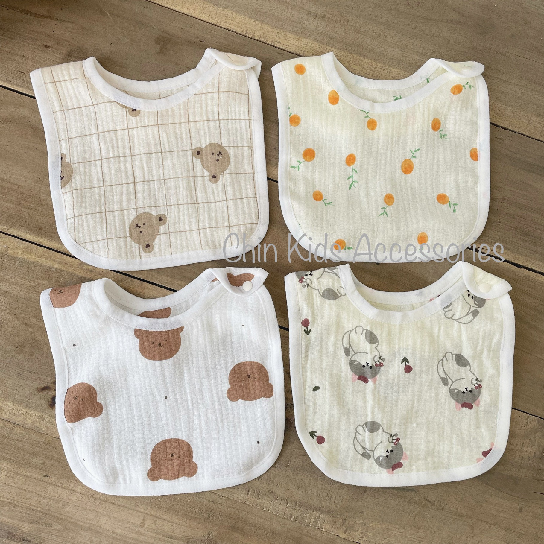 Yếm xô muslin 4 lớp hình họa tiết xinh xắn cho bé