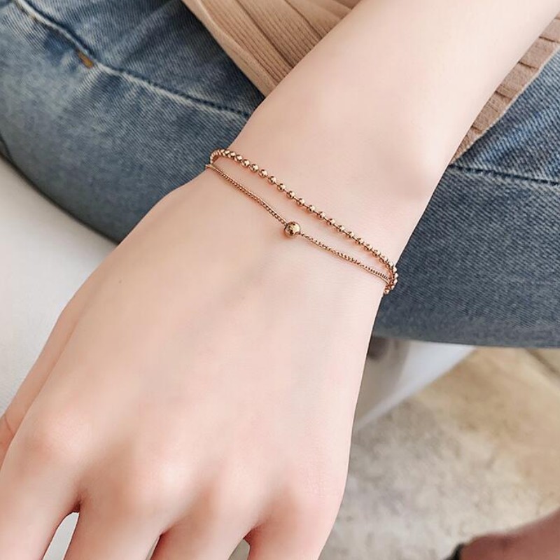 Lắc tay 2 tầng titan ko đen tt 2773