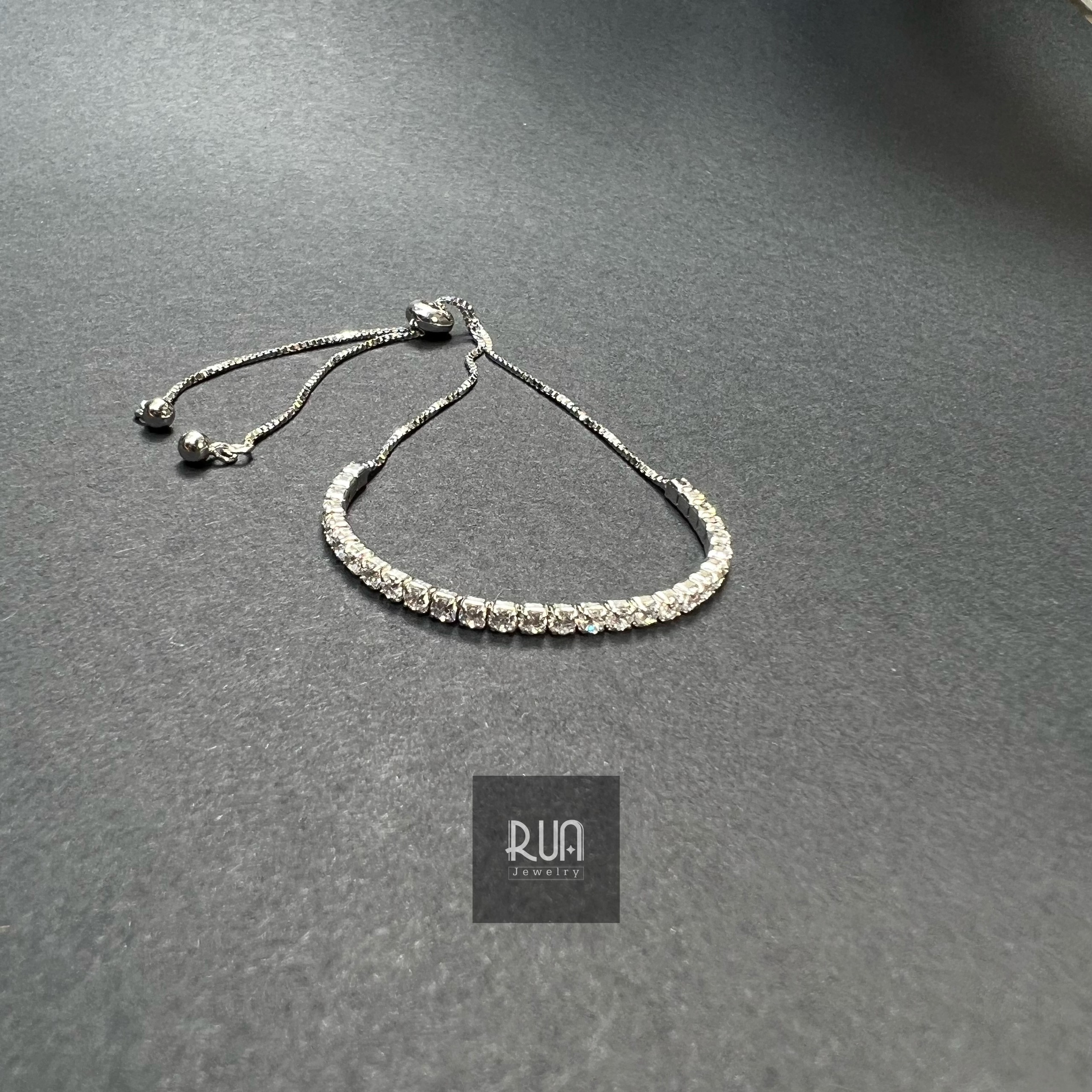 Lắc dây rút đính đá bạc 925 xi bạch kim siêu sáng