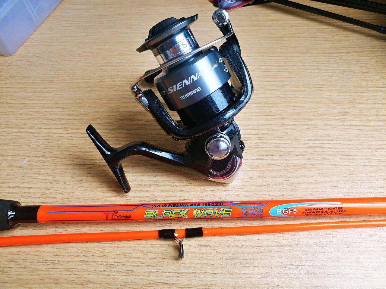 Sét cần black wave và máy câu shimano sienna 4000fe