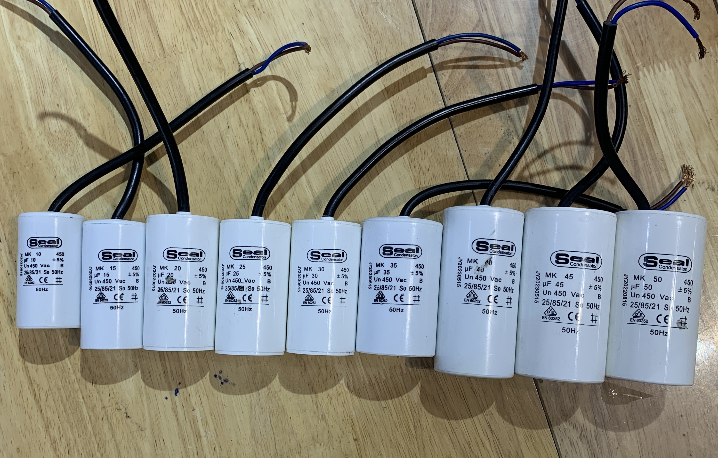 Tụ điện ngậm nhựa dây seal 10uf 15uf 20uf 25uf 30uf 35uf 40uf 45uf 50uf chất lượng cao
