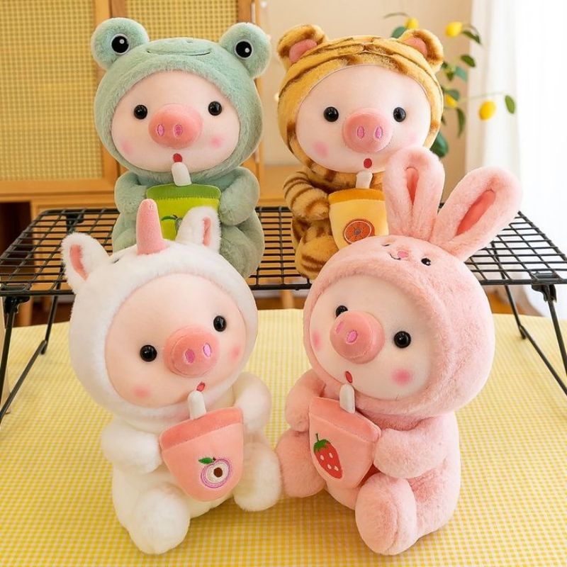 Thú nhồi bông heo uống trà sữa 23cm