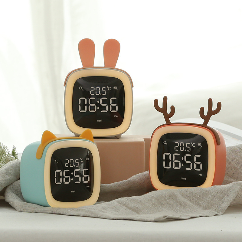 Đồng hồ để bàn đa năng cute pet tv, đồng hồ báo thức - nhiệt độ - đèn ngủ.