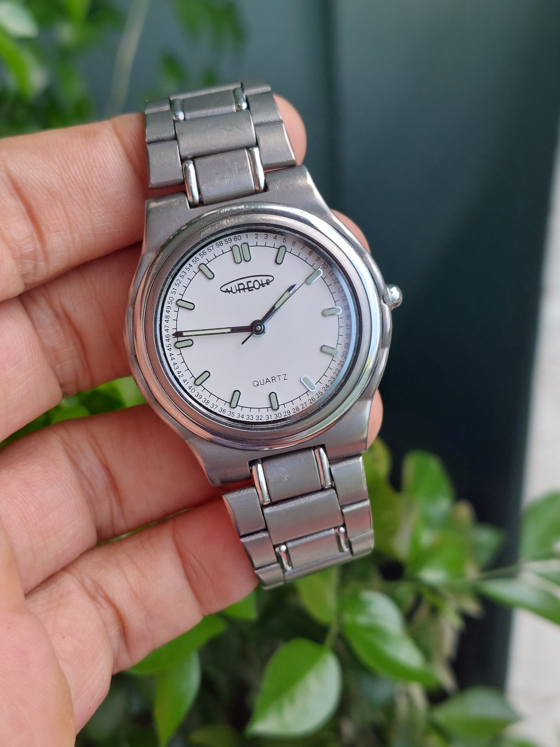Đồng hồ Thuỵ Sĩ nam Aureole Titan chạy pin hàng Si